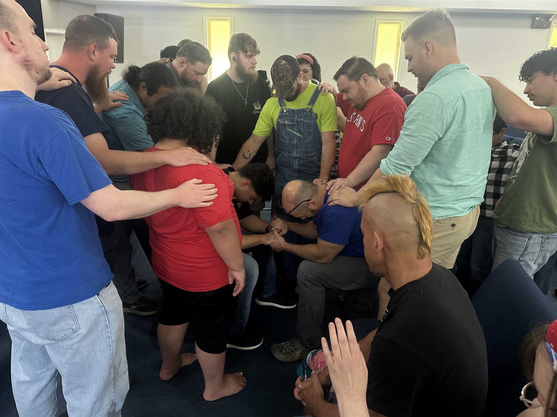 Believers gathered in prayer